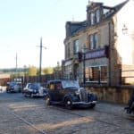 Wolseleys driving around the Beamish museum